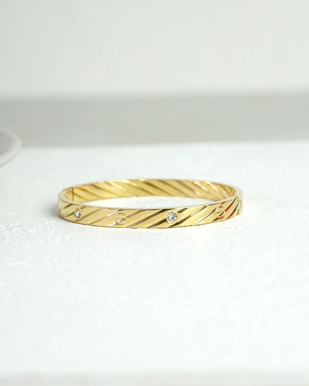 Golden Twirl CZ Bangle